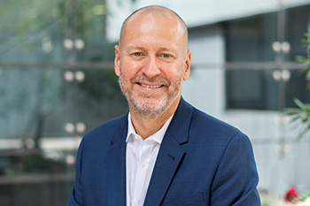 Professor Doug Hilton wearing a navy suit. Image credit: WEHI